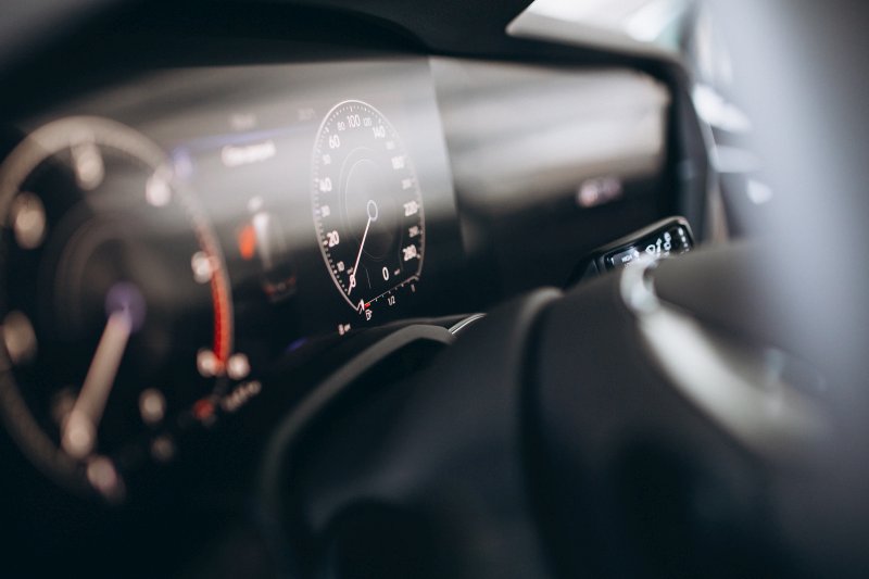 Car dashboard and wheel close up